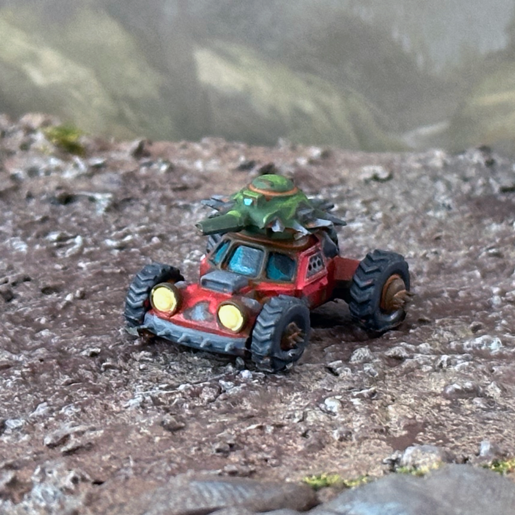 The reave killcar, a small all terrain buggy with spiked wheels and a small turret